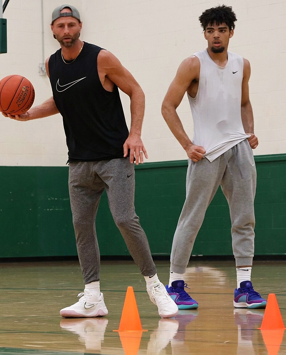 Ryan Werch coaching a player during a training session